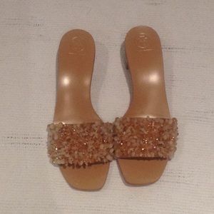 Women's Tory Burch slip on sandals with a heel